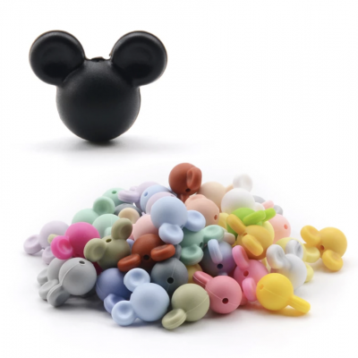 Peças plásticas coloridas em forma de cabeça de rato