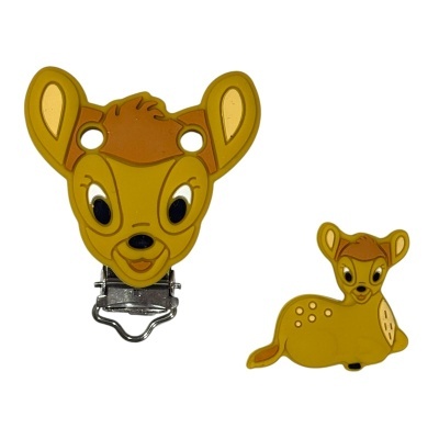 Acessórios em silicone amarelo com forma e rosto de veado e clip prateado
