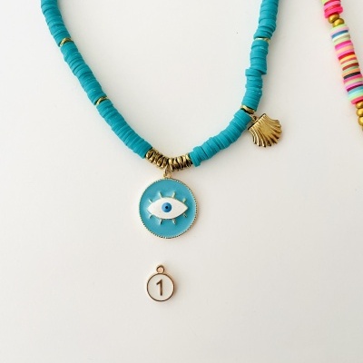 Colar turquesa com pendentes olho azul e concha dourada