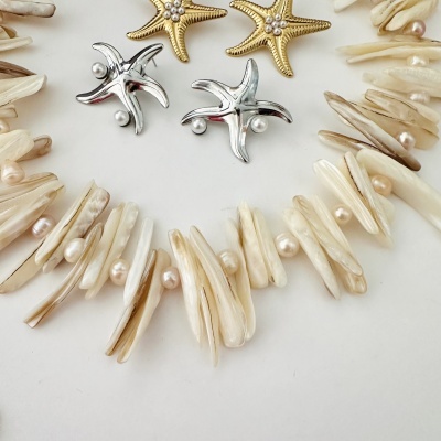 Colar e brincos em forma de estrela do mar com pérolas