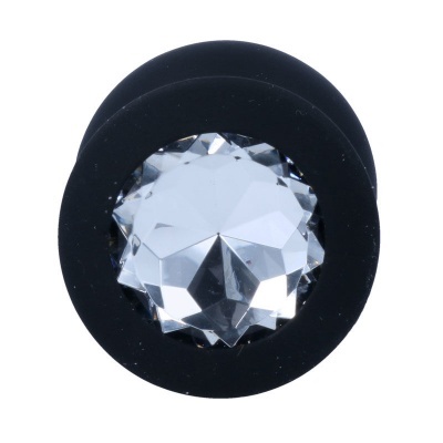 Produto redondo preto com cristal facetado no centro