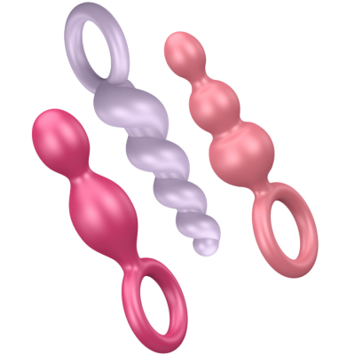 Brinquedos sexuais de silicone rosa e lilás com formas texturizadas e anéis de controlo.