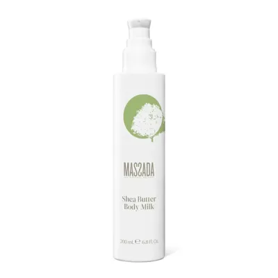 Frasco branco com tampa de bomba da marca Massada com Shea Butter Body Milk