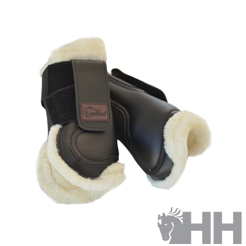 Protetores de salto para cavalo pretos com interior branco e fecho em velcro