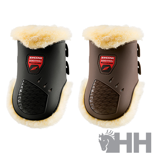 Proteções para patas de cavalo com forro felpudo creme, uma preta e outra castanha, com logótipo ZANDONA