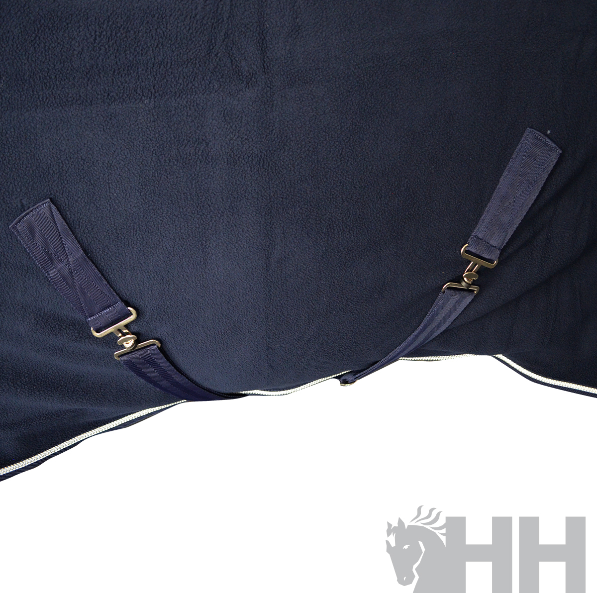 Capa de cavalo azul escuro com fechos dourados e tiras ajustáveis