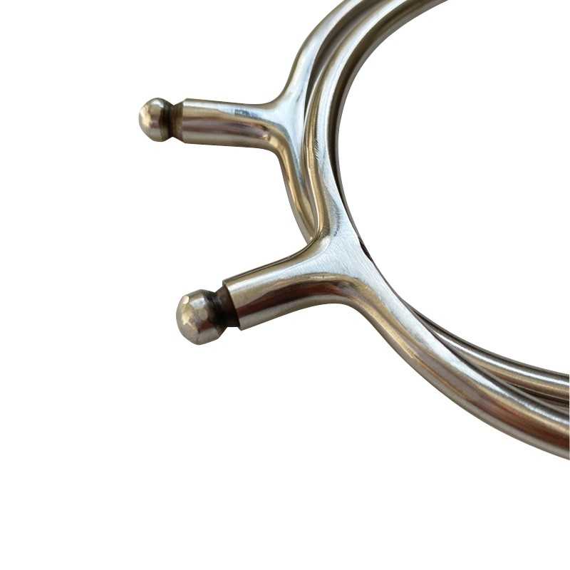 Utensílio de cozinha metálico prateado com pontas arredondadas