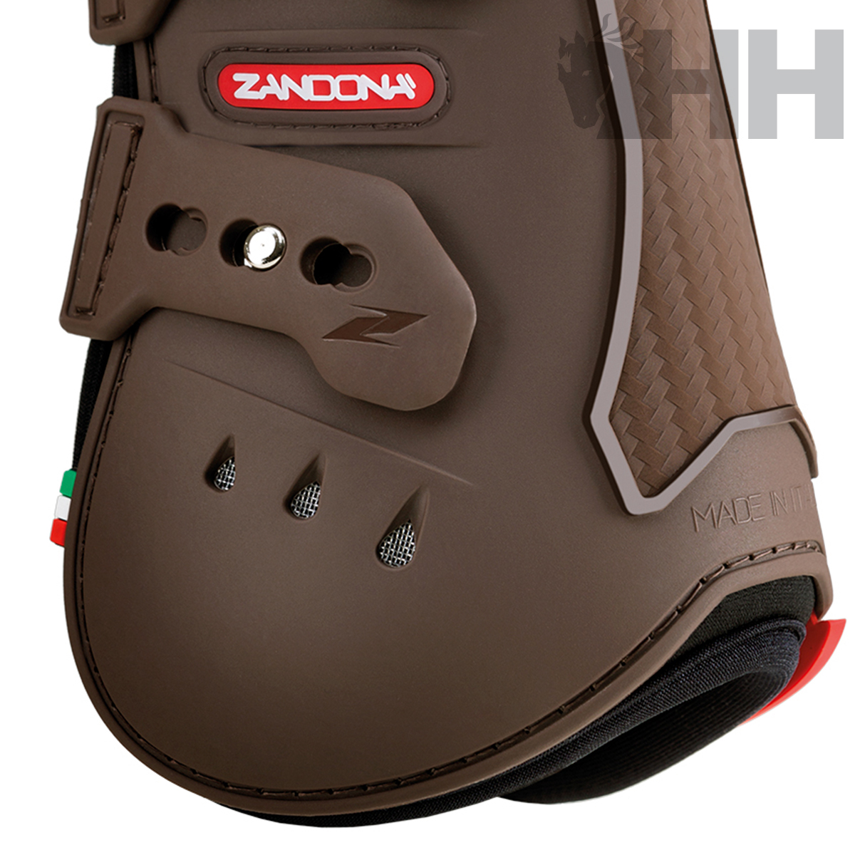 Proteção para equitação castanha com detalhes vermelhos e brancos e padrão trançado