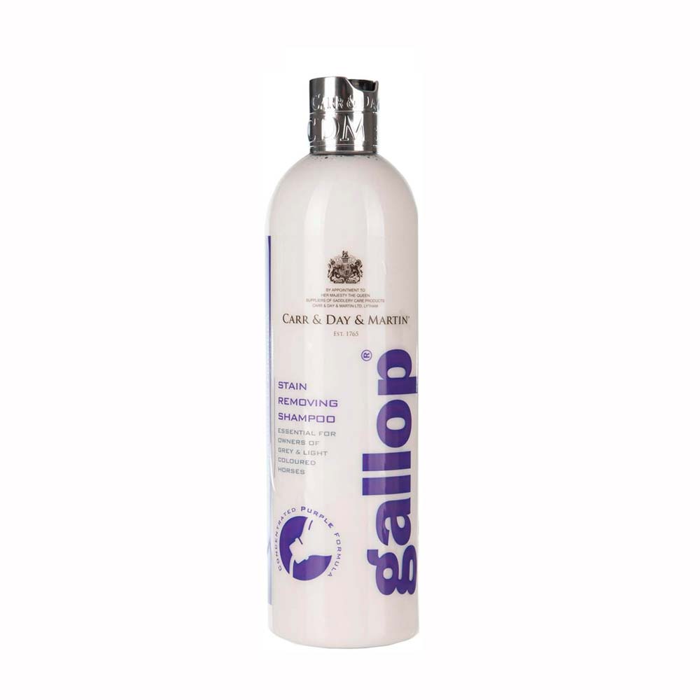 Frasco branco de shampoo para remoção de manchas com tampa metálica e texto roxo