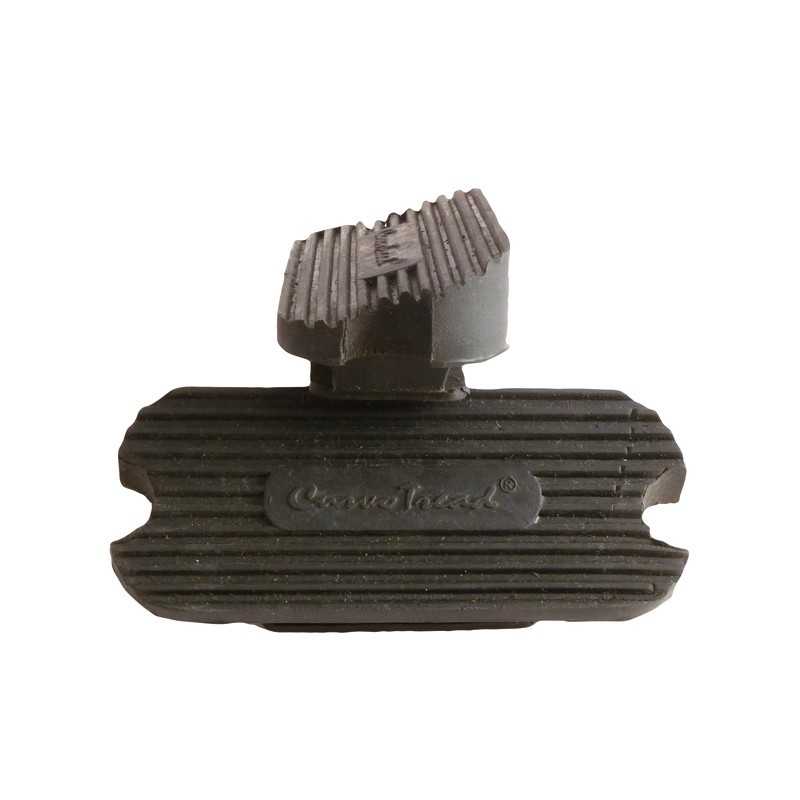 Peça de borracha preta com ranhuras e texto Velo-Equip