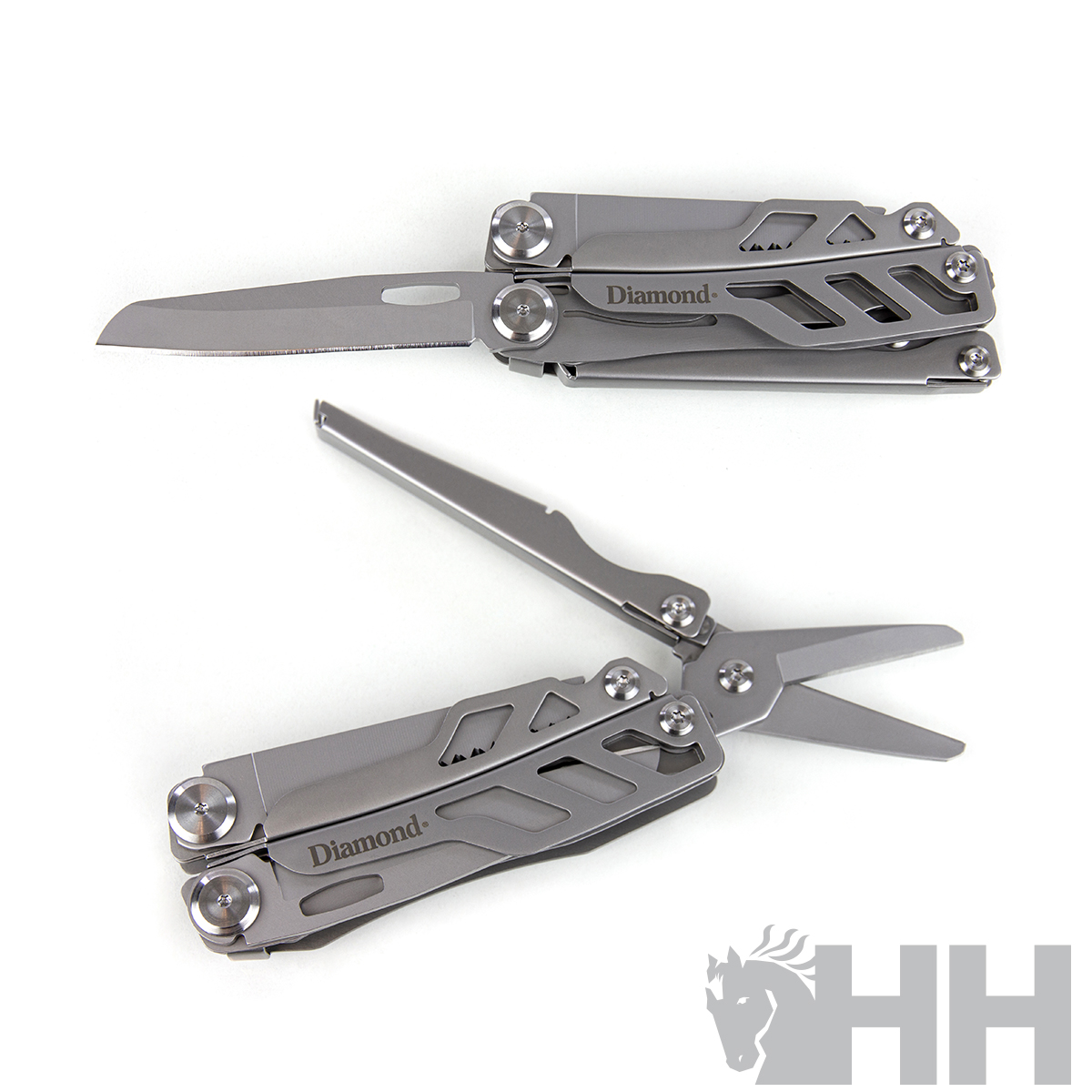 Canivete multifunções metálico prateado com lâmina e tesoura