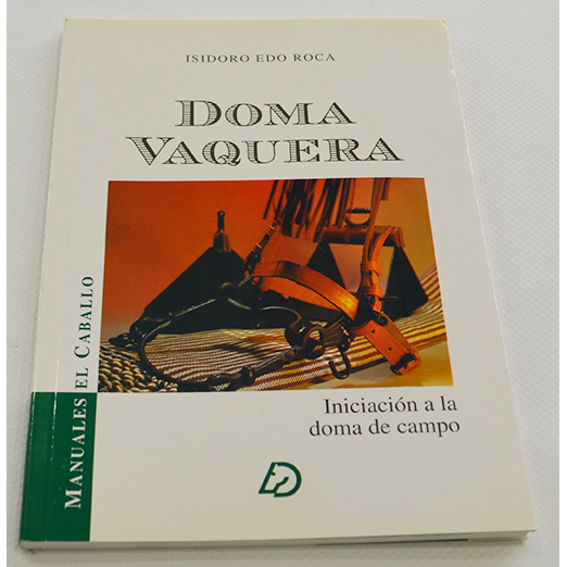 Capa de livro 'Doma Vaquera' com foto de equipamentos de equitação e texto em espanhol