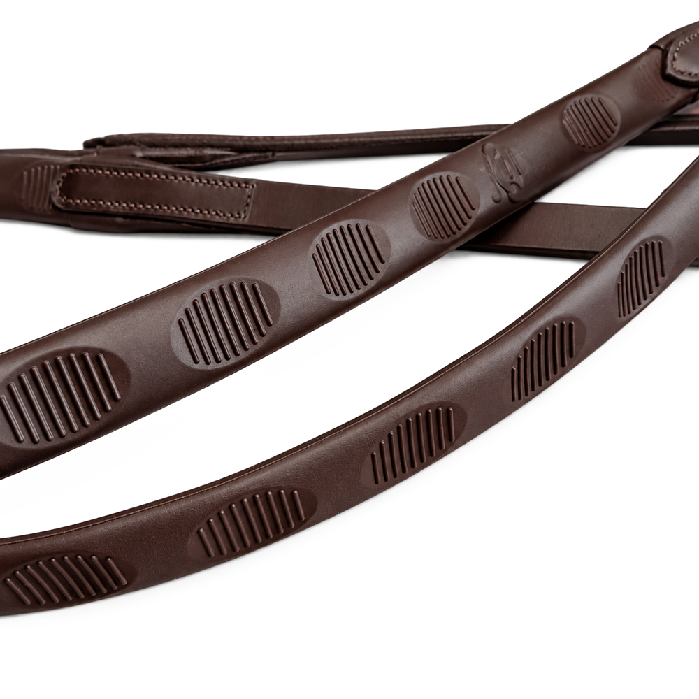 Correias de couro castanho para instrumentos musicais com relevo oval
