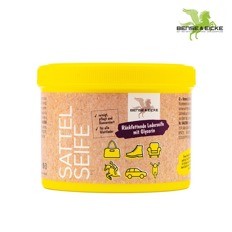 Frasco amarelo de produto para limpeza de couro Sattel Seife com ilustrações de objetos de couro