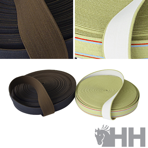 Rolos de fitas têxteis castanhas e verde claro com riscas