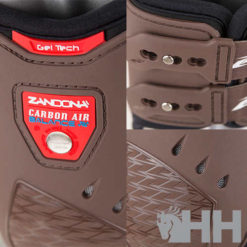 Produto de proteção ZANDONA com detalhes vermelhos e castanhos e fivelas metálicas