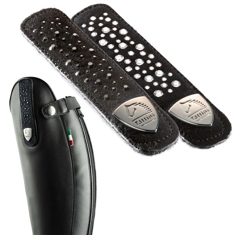 Perneira e protetores pretos de equitação com detalhes metálicos e fecho