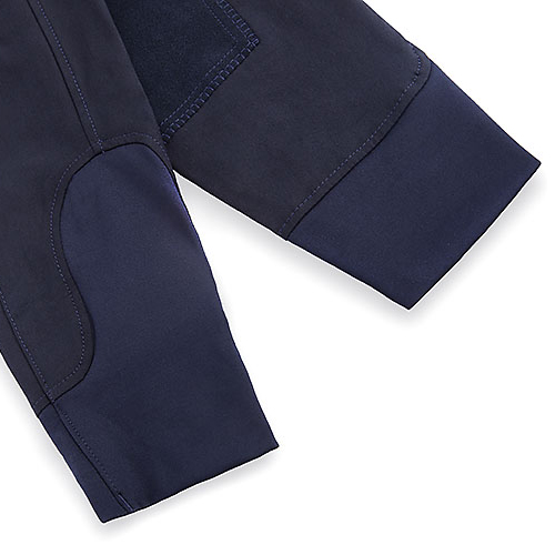 Mangas de casaco azul escuro com vários painéis e costuras