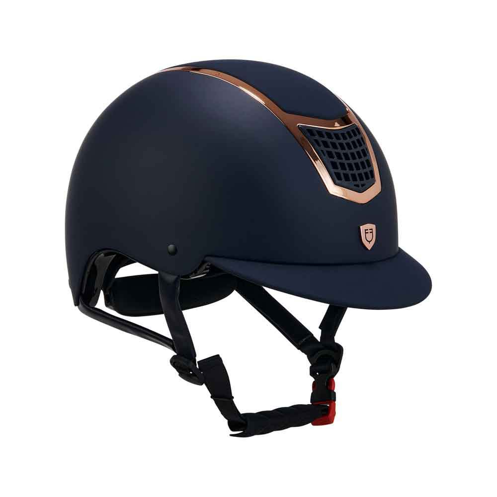 Capacete de equitação azul escuro com detalhes em cobre e viseira curta