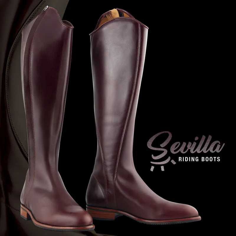 Botas de montar castanhas em pele com sola preta e salto de madeira