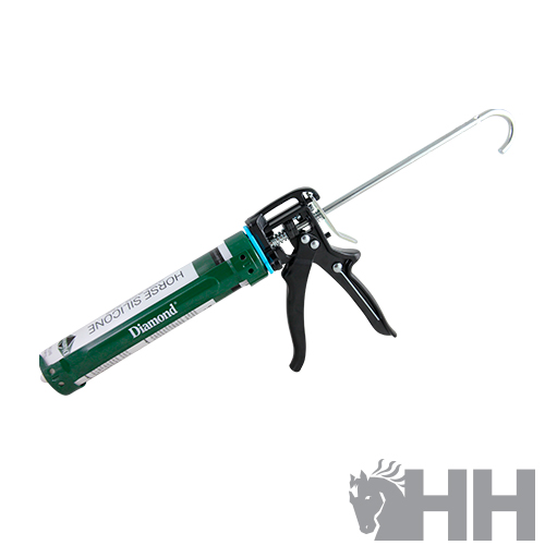 pistola de silicone verde e preta com rótulo HORSE SILICONE