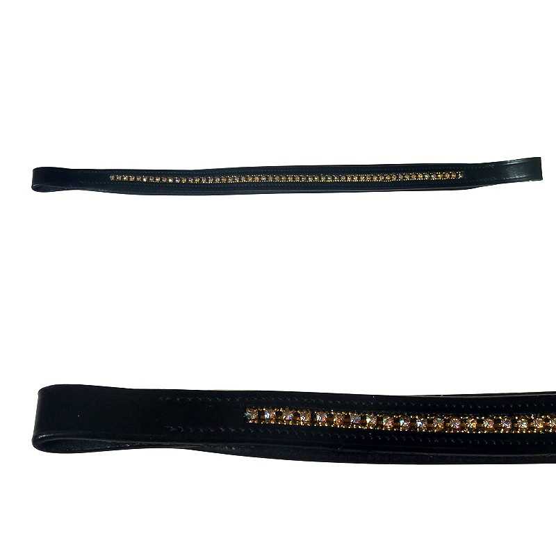 Correia preta com pedras douradas embutidas ao centro sobre fundo branco