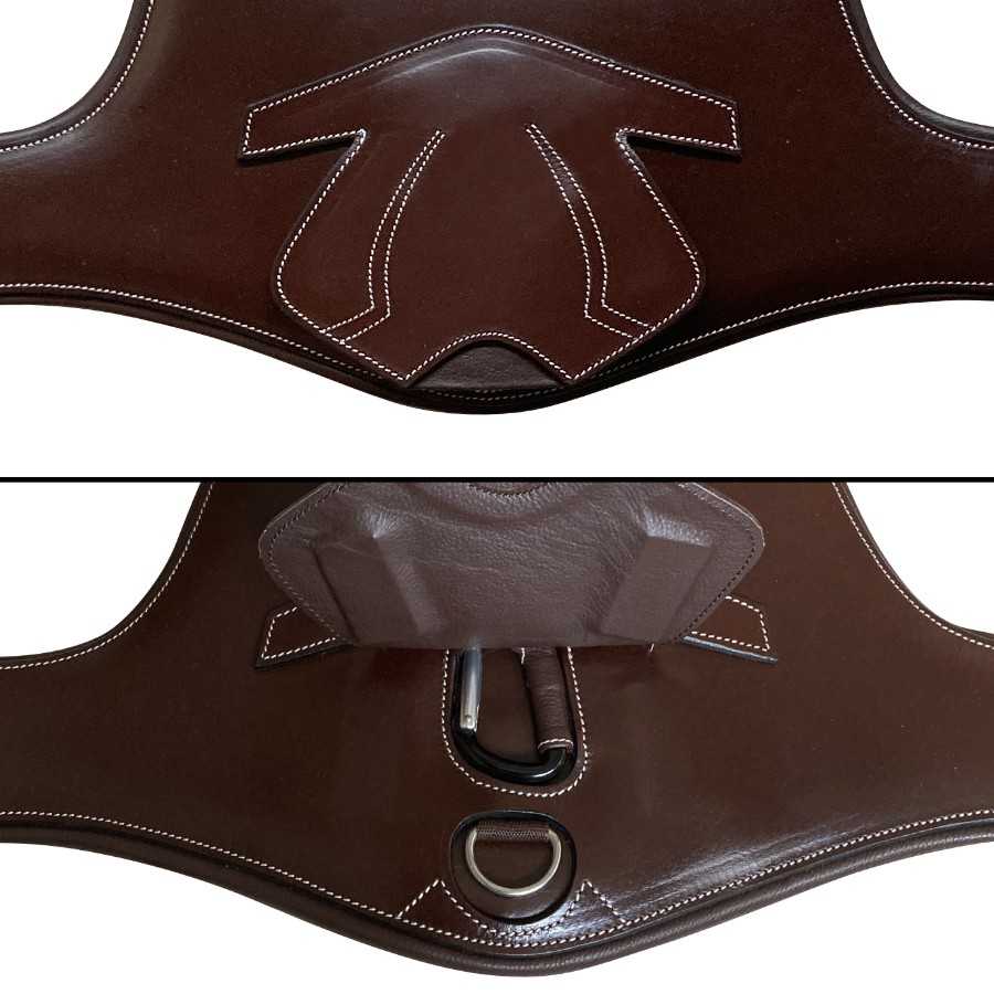 Produto de couro castanho com costuras brancas e argola metálica