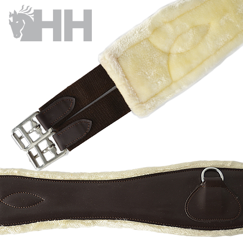 Cinta de equitação em couro castanho com forro creme e fivelas metálicas.