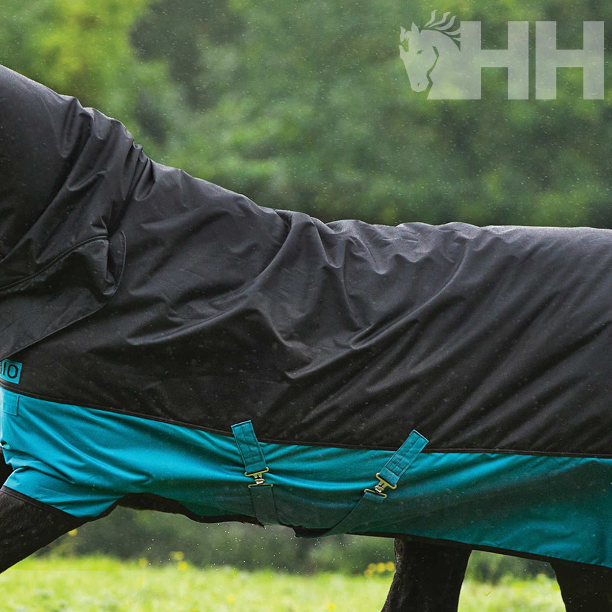 Cobertura para cavalo preta e azul-turquesa com fechos e logo HH