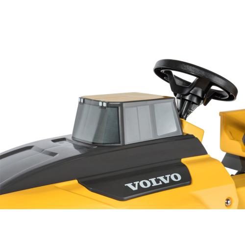 Carro de brinquedo amarelo e preto com volante e marca VOLVO
