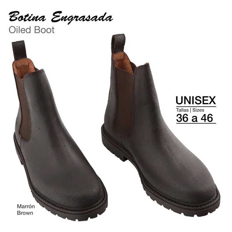 Botinas unissexo castanhas oleadas com sola preta e elásticos laterais