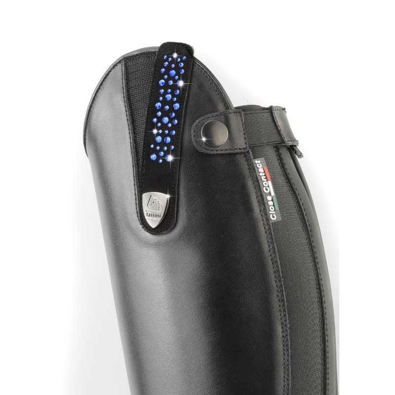 Bota equestre preta com detalhes em azul e etiqueta CalaScience.