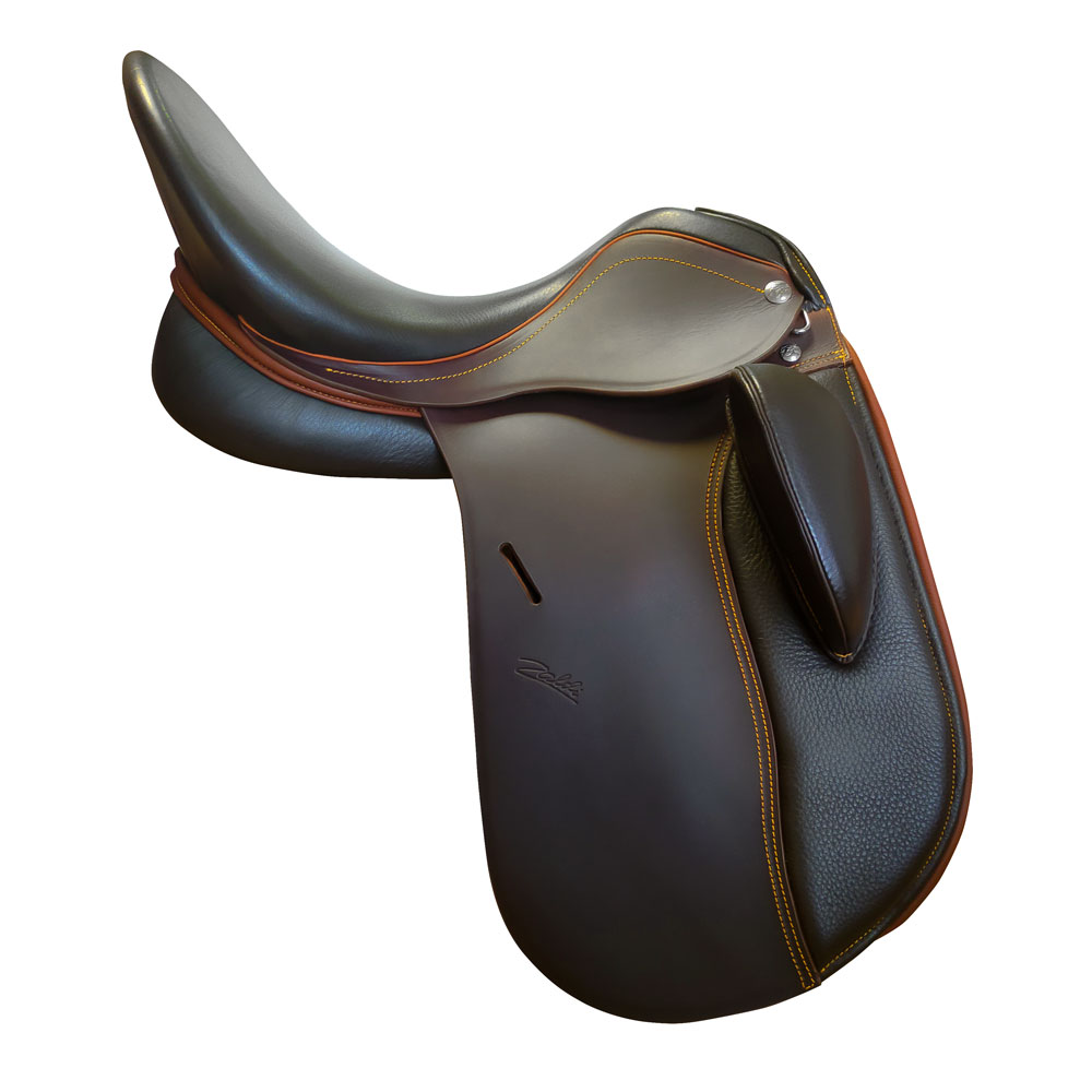 Sela de cavalo em pele preta e castanha com costuras amarelas