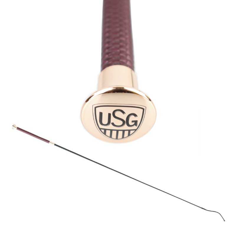 Vareta fina com cabo castanho trançado e extremidade dourada com logótipo USG