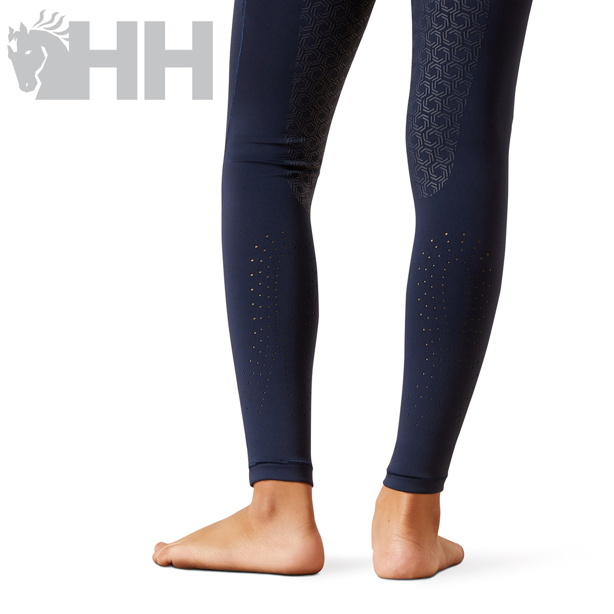 Leggings desportivas pretas com padrão texturado e pequenas perfurações atrás das pernas