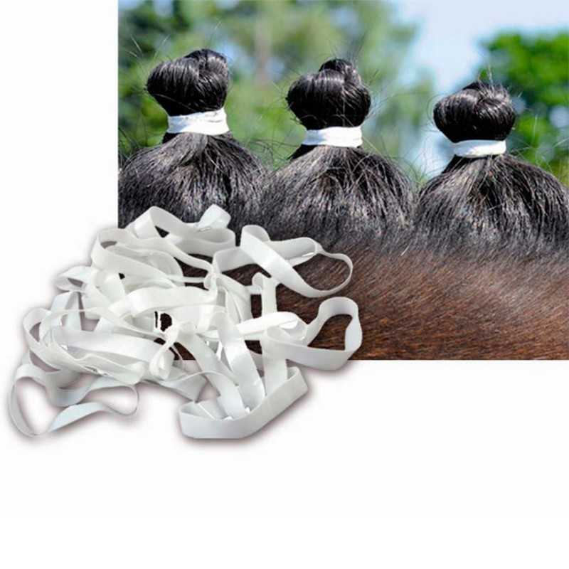 Elásticos brancos para cabelo com cabelo preto preso em rabos de cavalo