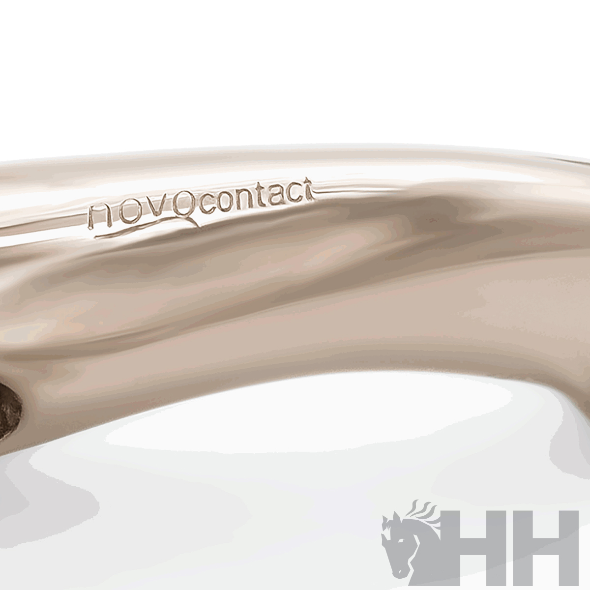 Lente de contacto transparente com inscrição 'novo contact'