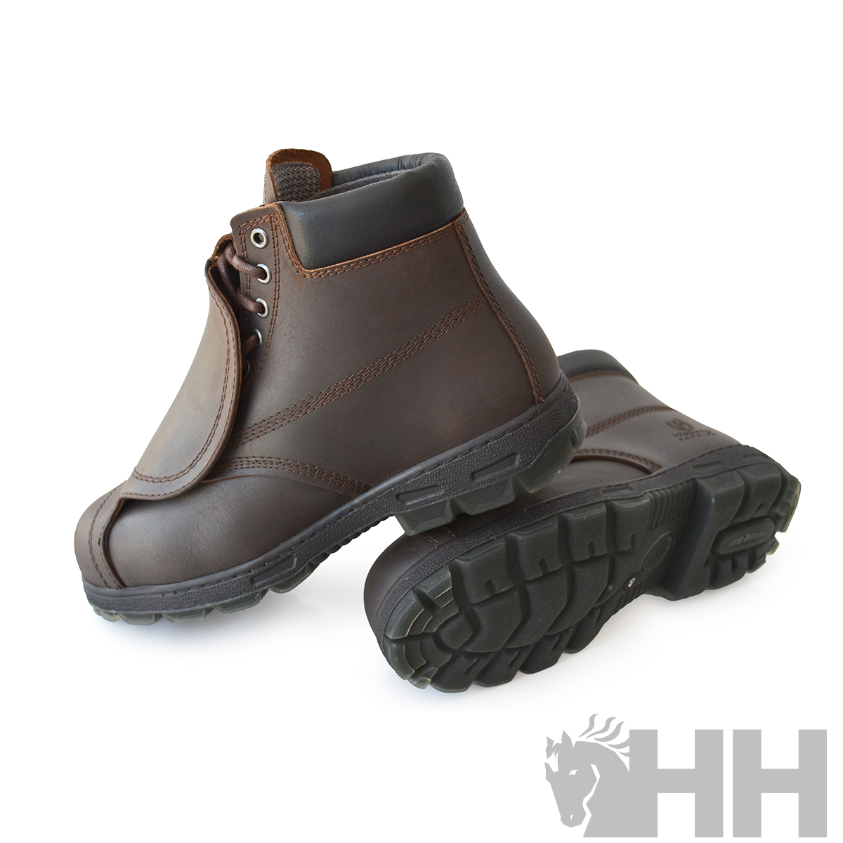 Botas de trabalho castanhas em pele sintética com sola preta robusta em borracha