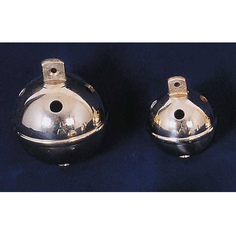 Dois guizos metálicos dourados sobre fundo azul escuro