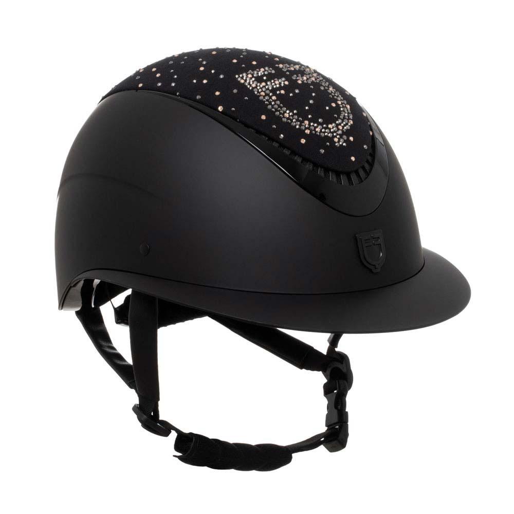 Capacete de equitação preto com cristais brilhantes no topo e queixeira ajustável.