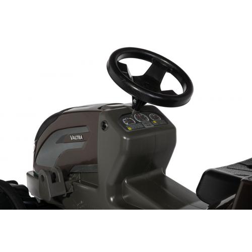 Brinquedo tipo veículo cinzento com volante preto e painel com símbolos