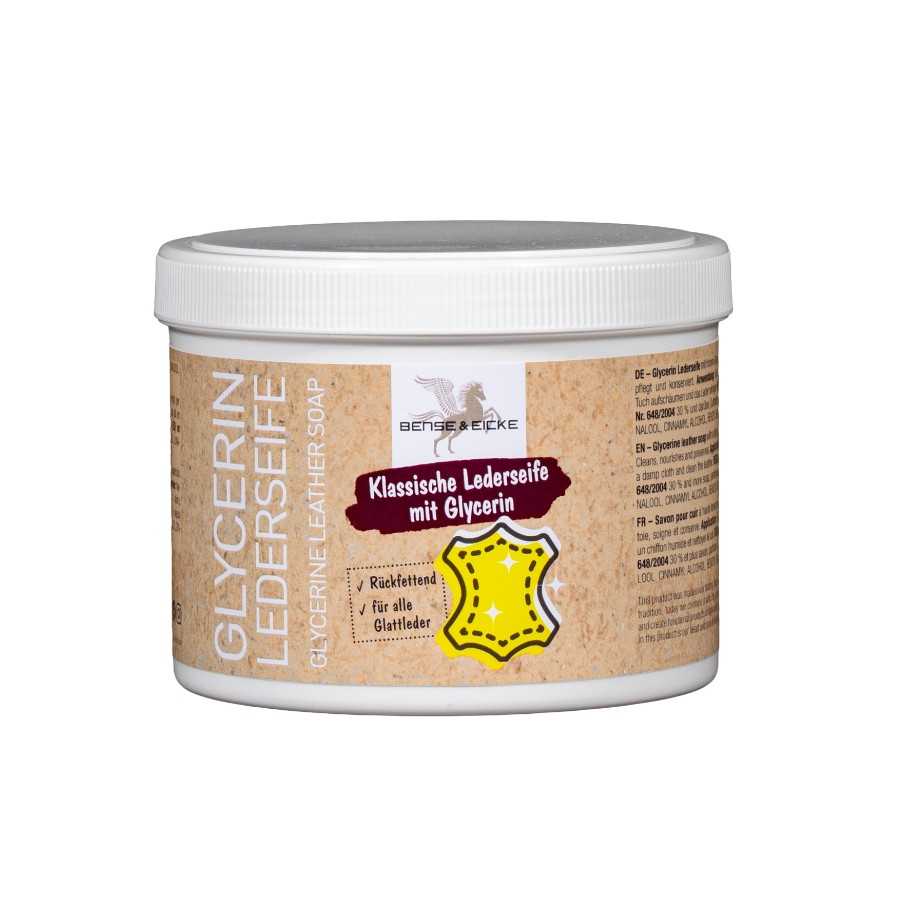 Sabão para couro com glicerina em recipiente branco com rótulo castanho claro com texto e símbolo amarelo