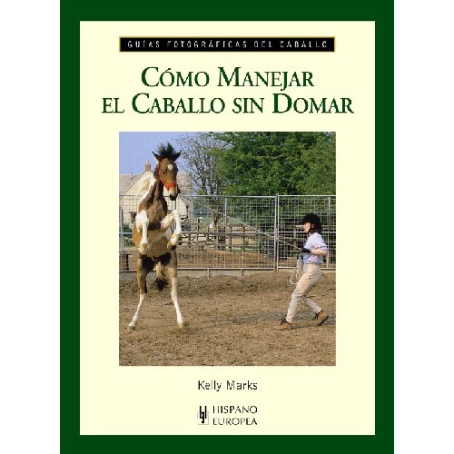 Capa do livro 'Cómo Manejar el Caballo sin Domar' com imagem de cavalo a saltar e pessoa no picadeiro