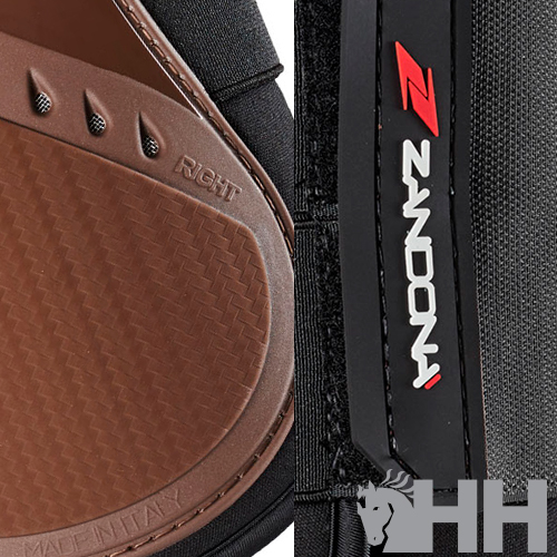 Braçadeira desportiva preta com detalhes castanhos e texto NZOONI