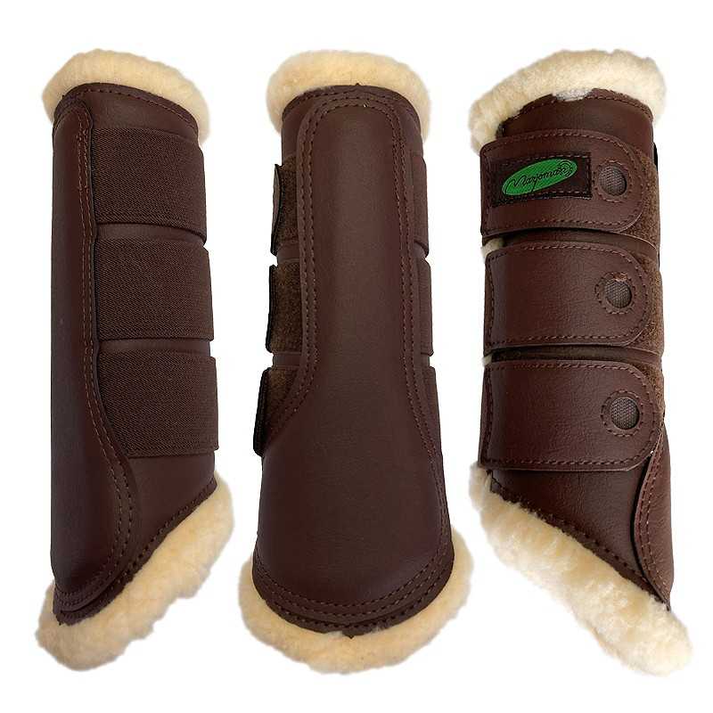 Proteções castanhas para equitação com interior de pêlo creme e fecho de velcro ou fivelas