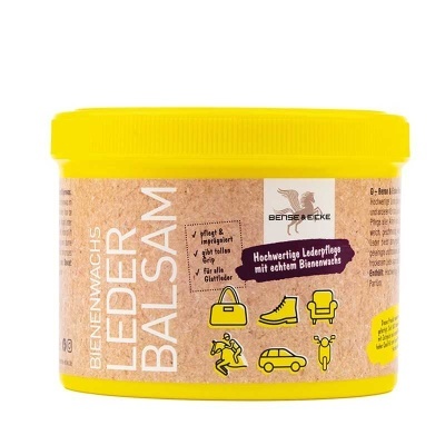 Frasco amarelo de cera para couro Bense & Eicke com texto em alemão e ícones amarelos de uso