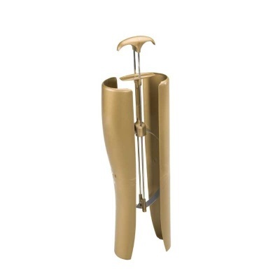 Dispositivo dourado para esticar sapatos com estrutura metálica e pegador em T