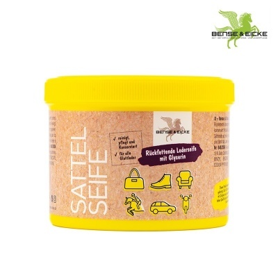 Frasco amarelo de produto para limpeza de couro Sattel Seife com ilustrações de objetos de couro