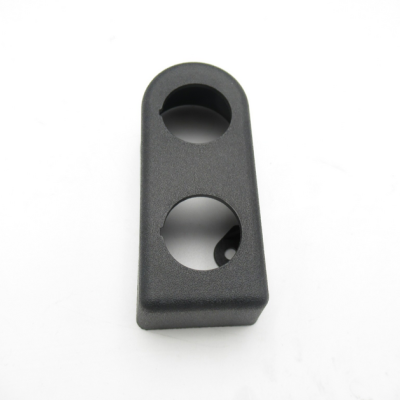 Suporte em plástico preto com dois orifícios circulares