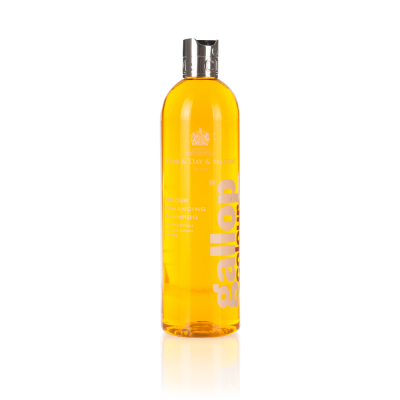 Frasco amarelo de champô Carol's Daughter Gallop com tampa prateada